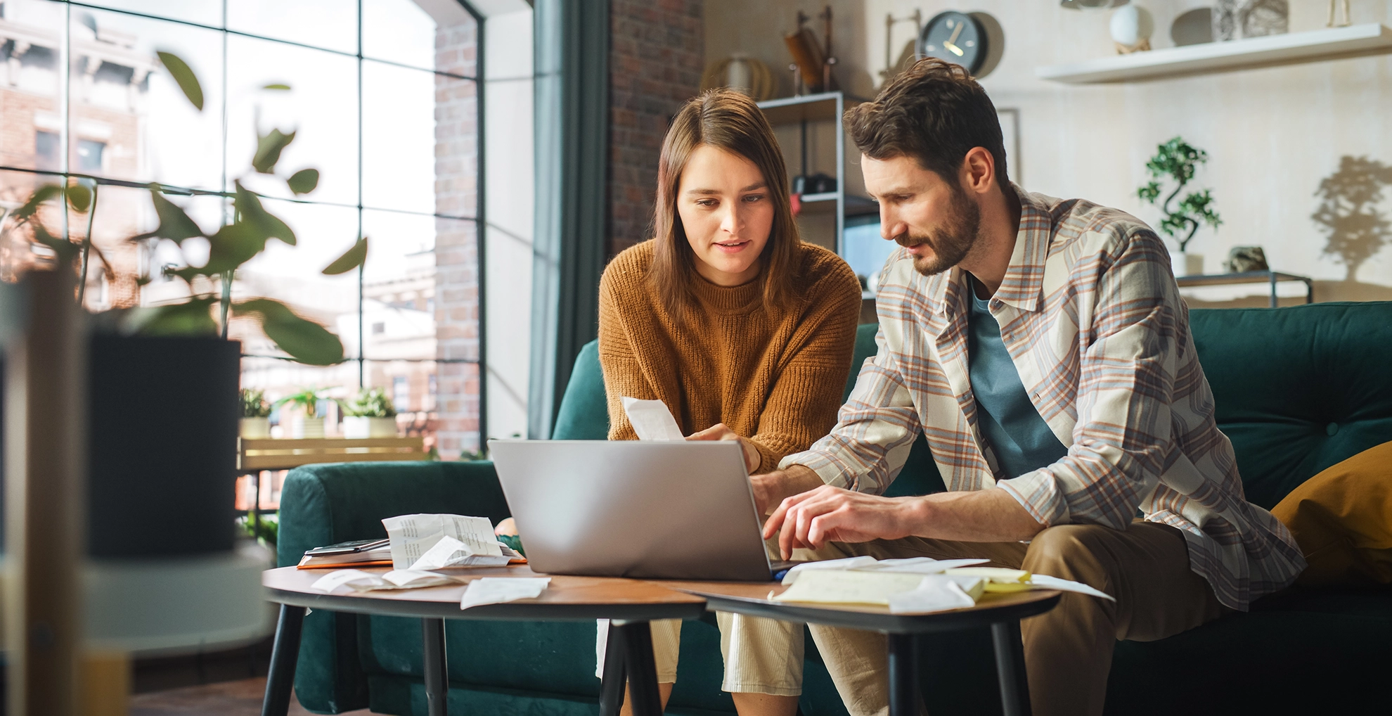 couple calculating finances